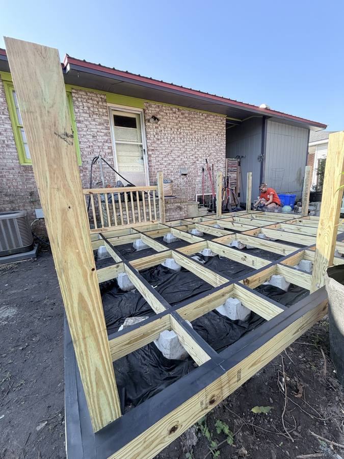 Team Depot volunteer framing the new deck
